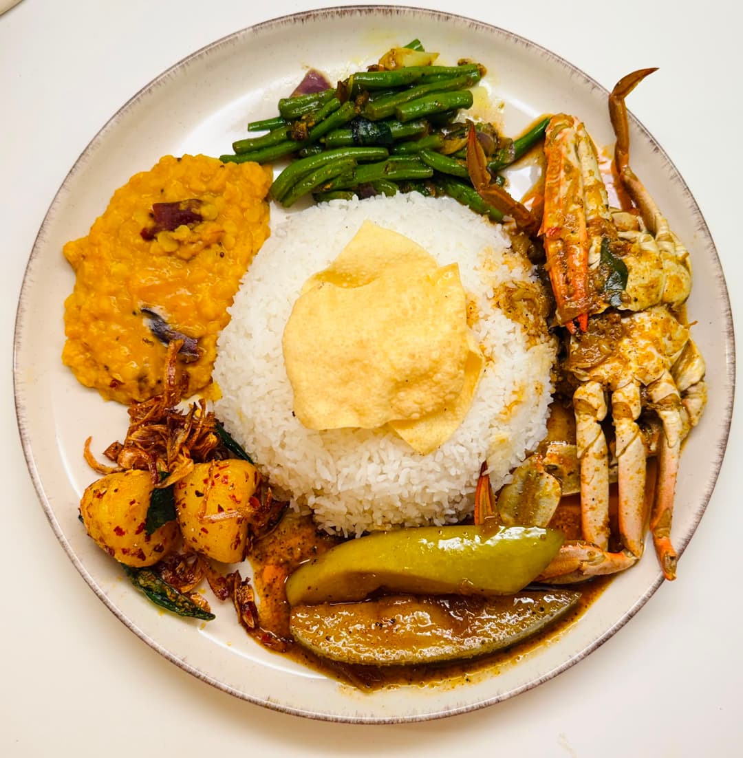 Sri Lankan rice and curry served with crab curry.